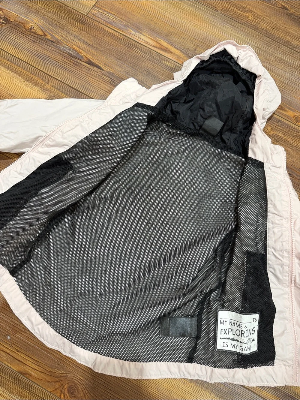 The North Face Kids Hooded Rain Jacket in Light Pink and Black